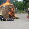 miembros de los bomberos de somoto realizando simulacro en feria municipal sobre reduccion de desastres